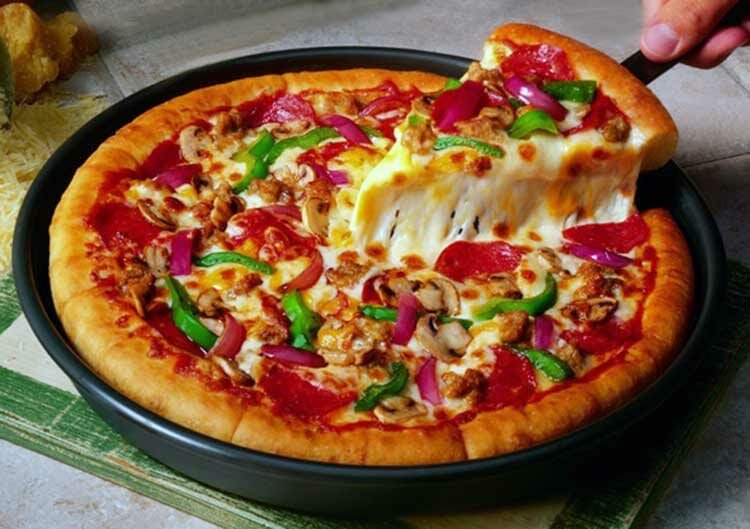 Comer pizza puede hacerlo más productivo en el trabajo
